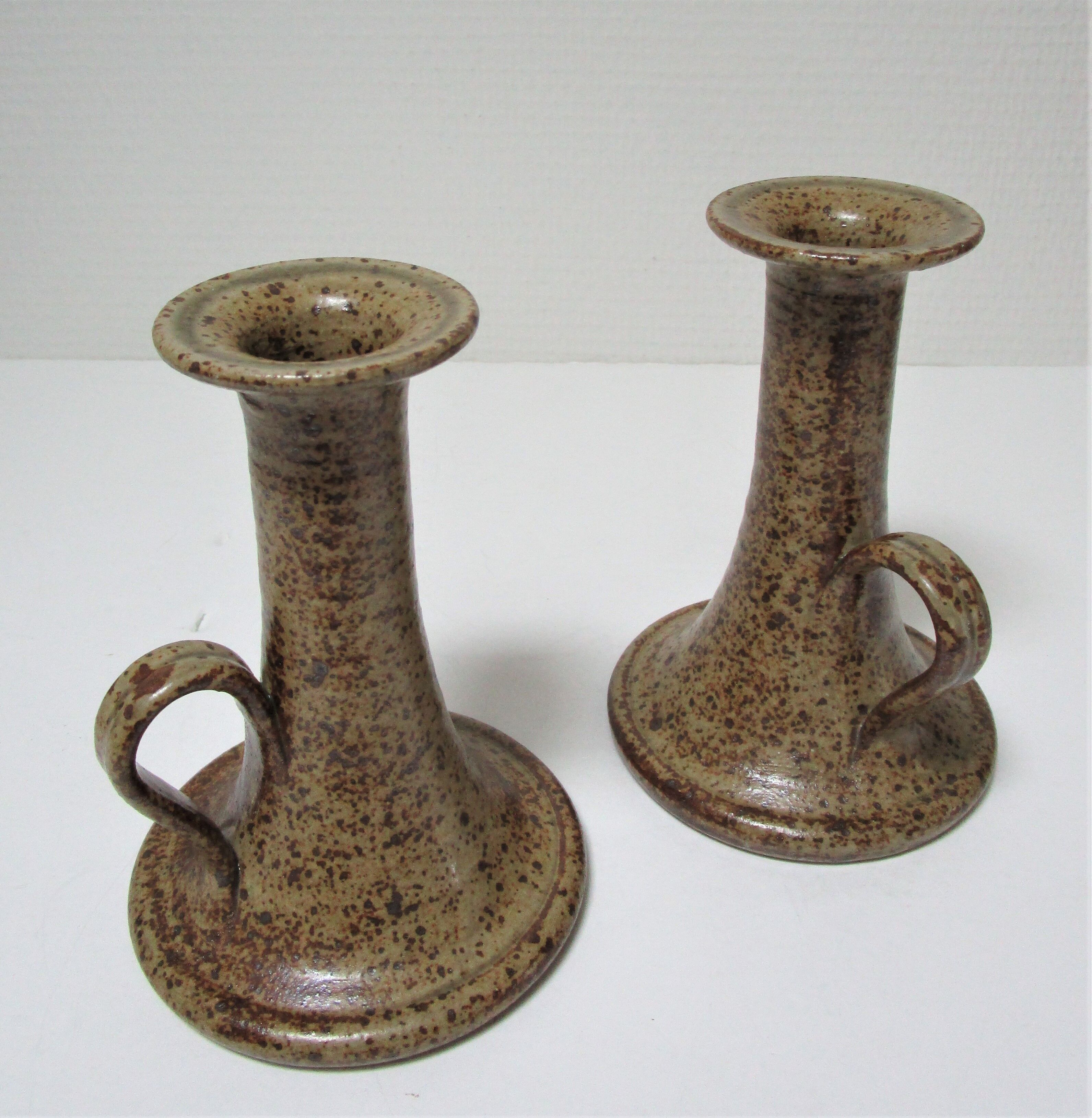Pair of vintage sandstone candlesticks