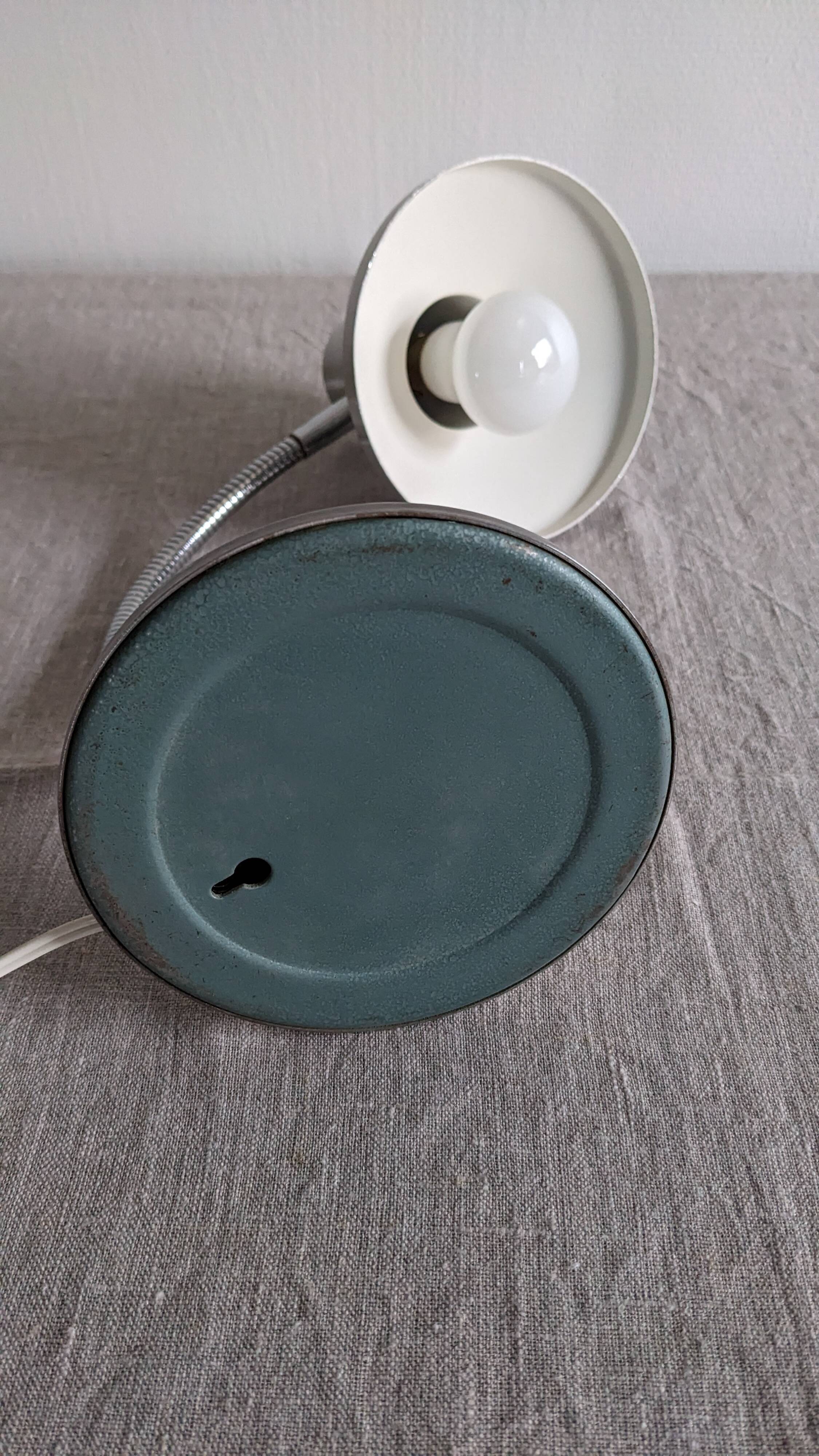 Articulated bedside lamp or wall light, France circa 1960.