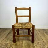 Pair of old wooden and straw children's chairs.