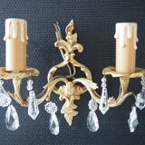 Pair of gilded bronze sconces and crystal pendants