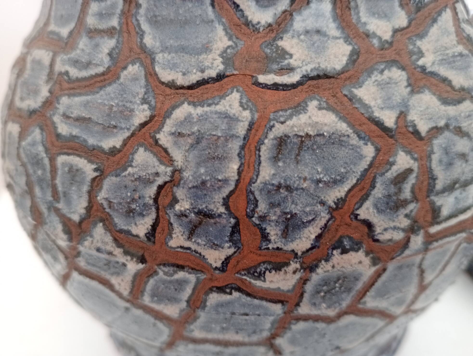 Blue glazed terracotta vase and candle holder