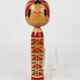 Decorative Togatta Kokeshi doll sculpture from northern Japan, hand-painted.