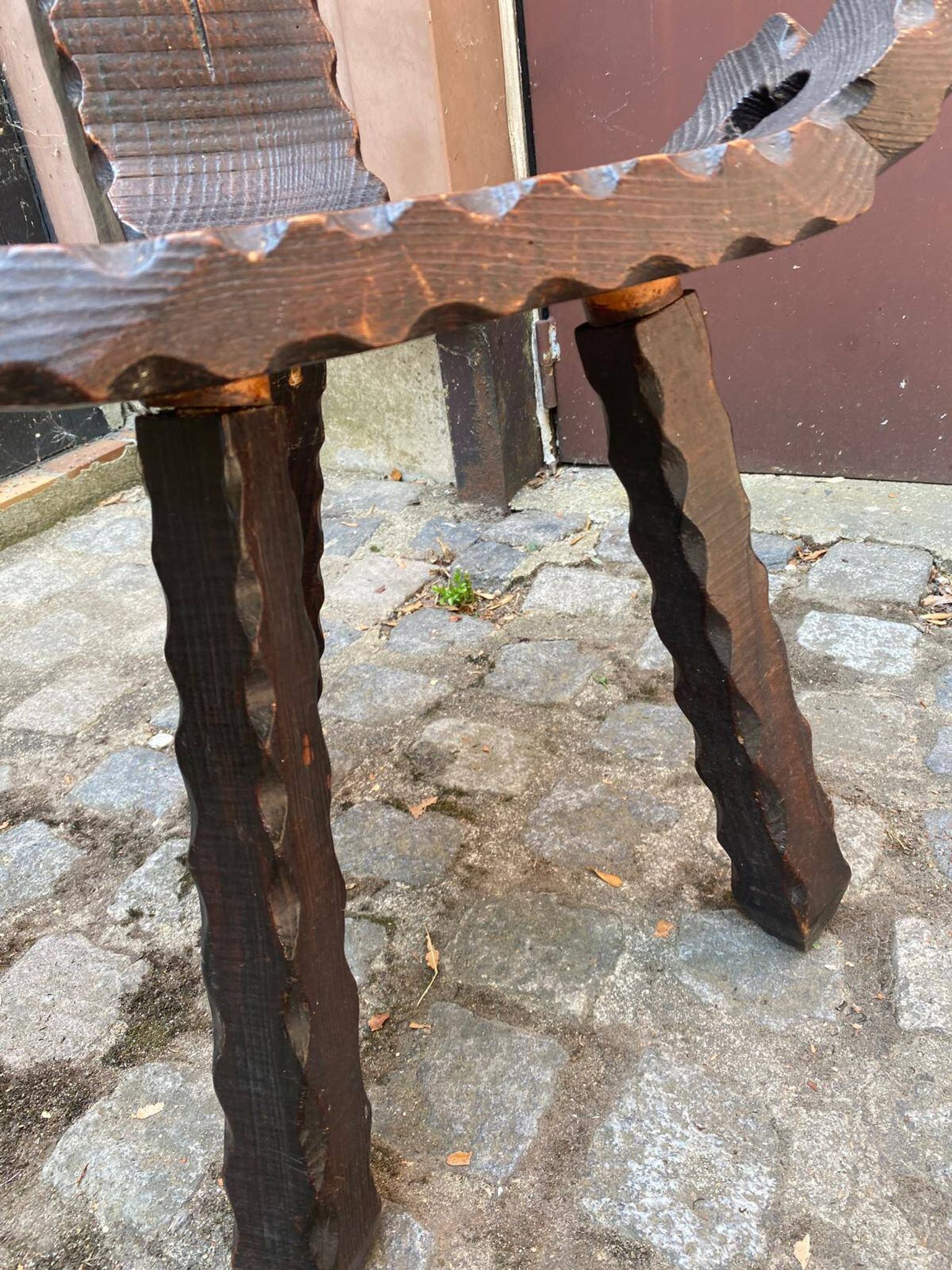 Vintage brutalist tripod chair in carved wood with wooden screw assembly XI.