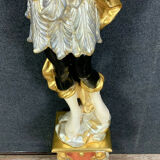 Early XXth era polychrome wooden torch has figuration of a Moor in traditional costume from the 18th