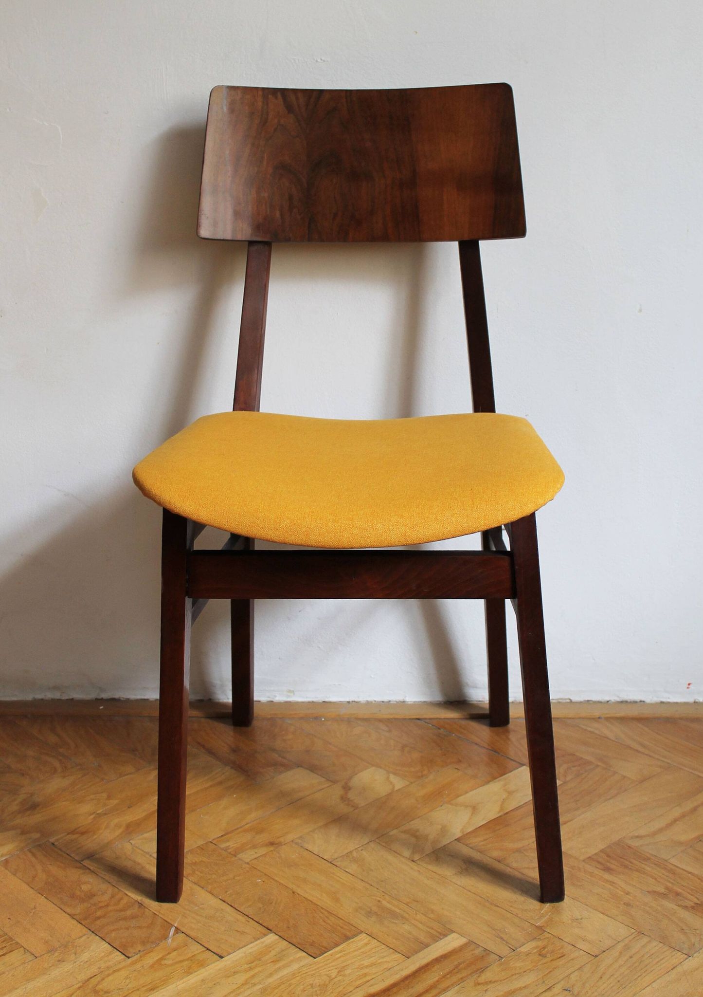 Vintage dining chair from the 1960s, Scandinavian style, wood and fabric.