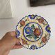Henriot Quimper dessert plates, hand-painted earthenware.