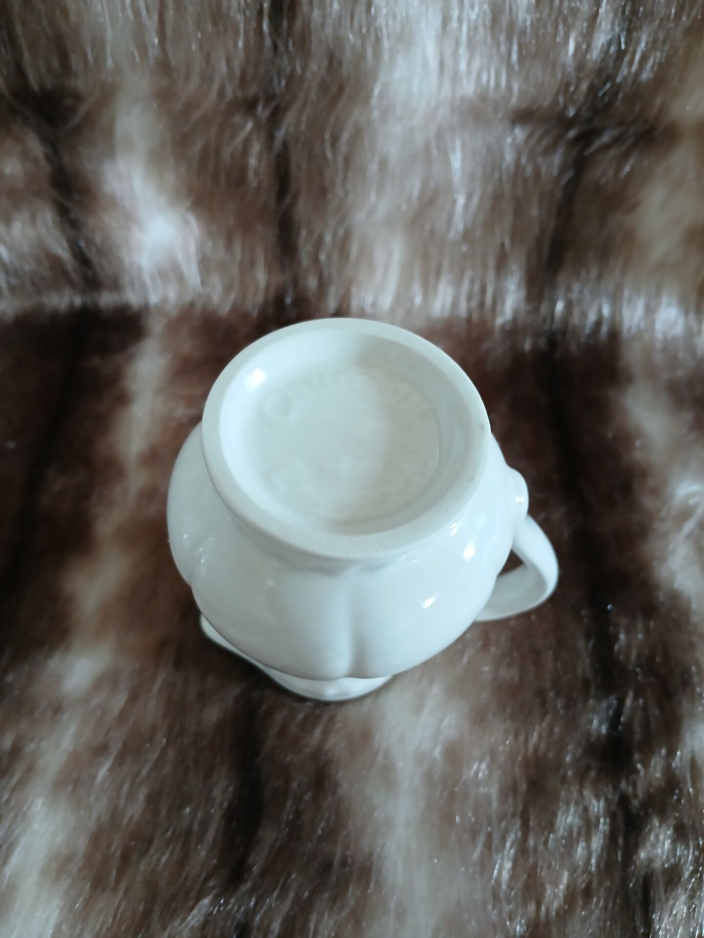 2 antique pitchers in white earthenware