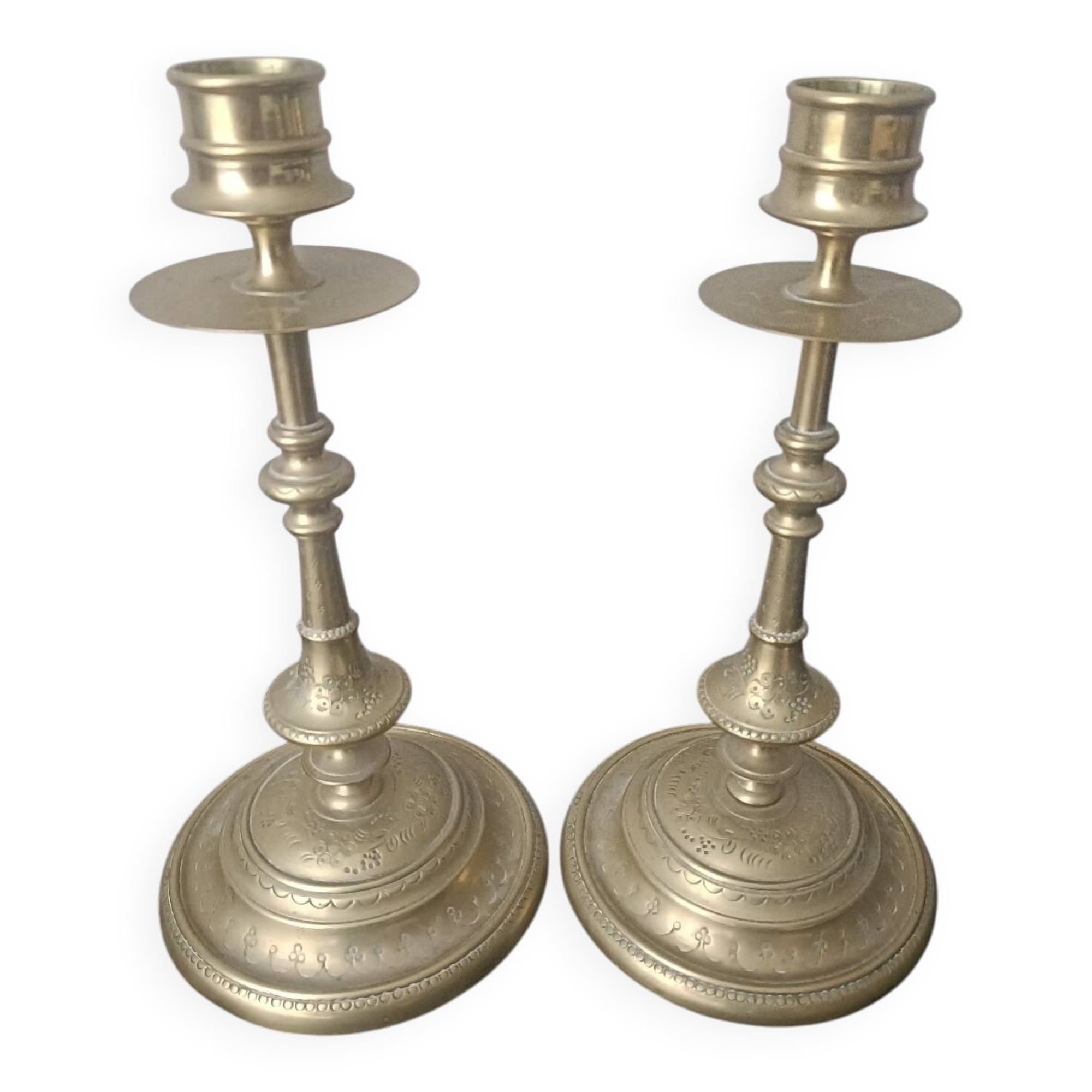 Pair of chiselled candlesticks