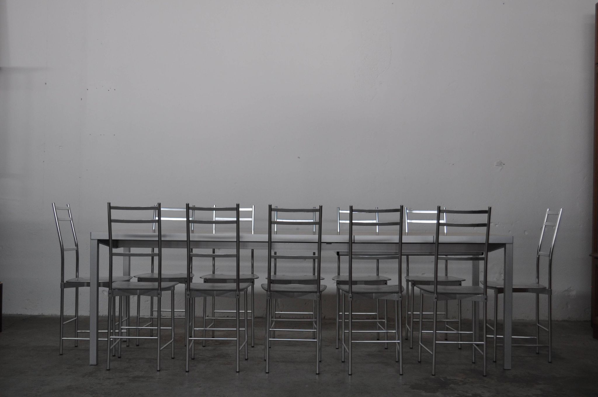 Bagutta Table and Aluminum Chairs by Opera Design for Ycami, 1980s, Set of 13