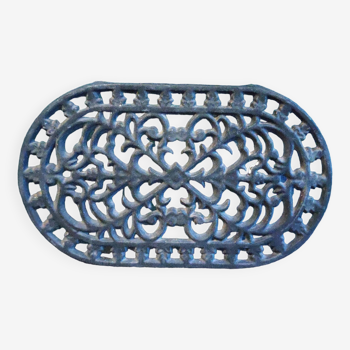 Vintage oval black cast iron trivet