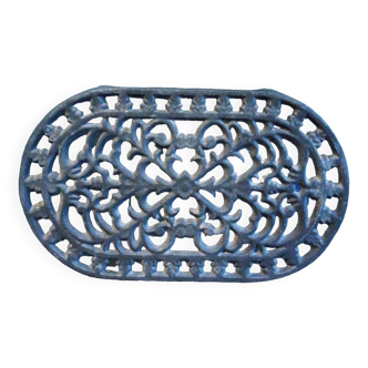 Vintage oval black cast iron trivet