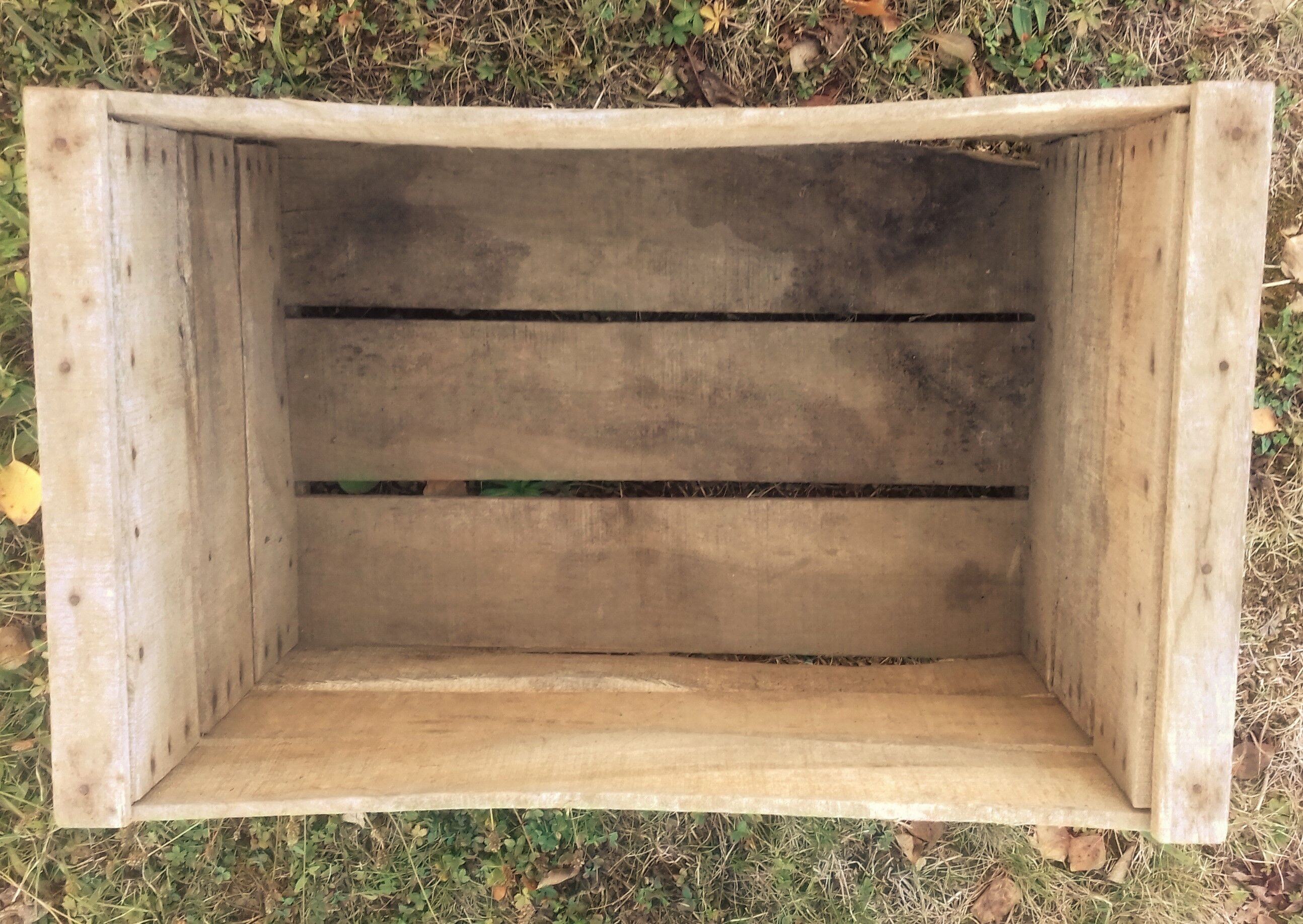 Wooden box with black letters