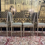 Suite de 4 chaises cannées style Louis XVI Jean Mocque