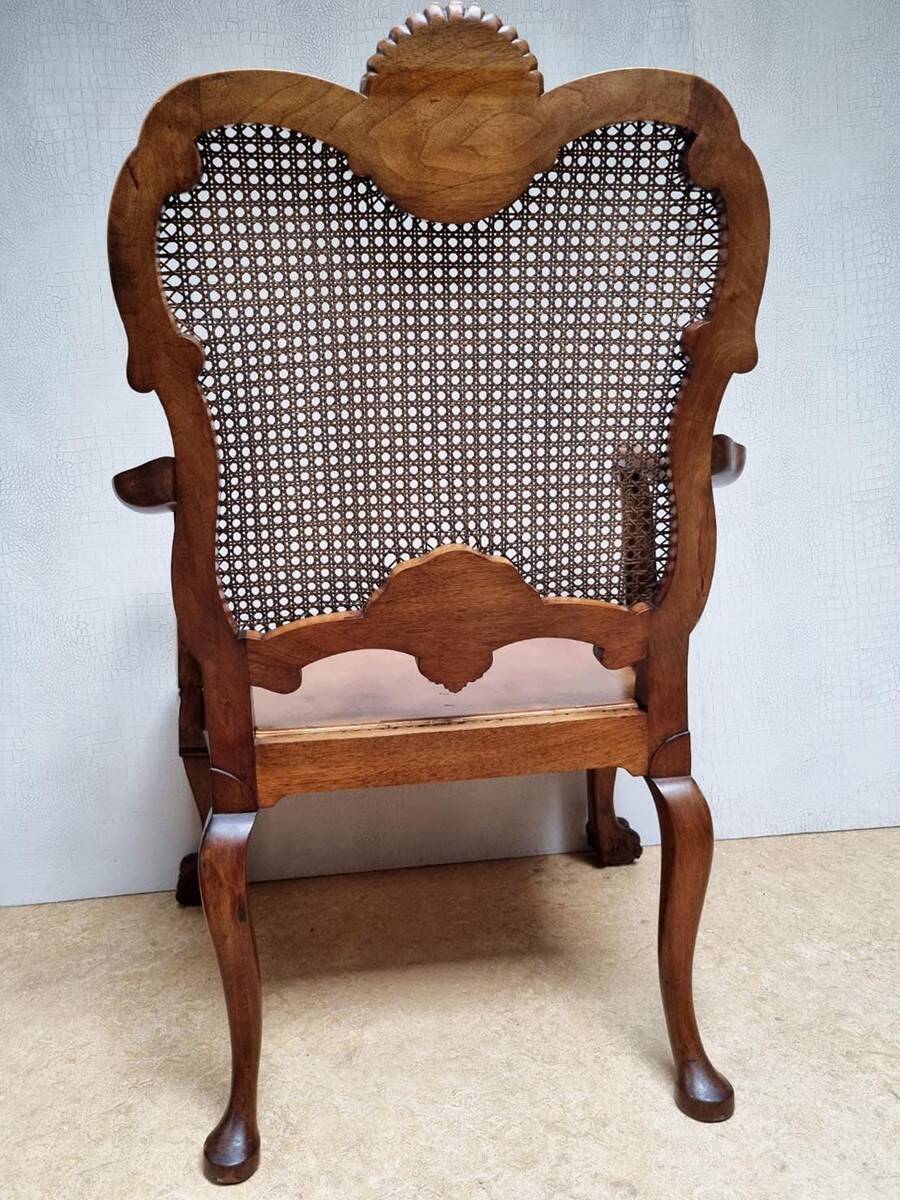 Chippendale Bergere Armchair, Carved Mahogany with Cane and Lion Claw Ball