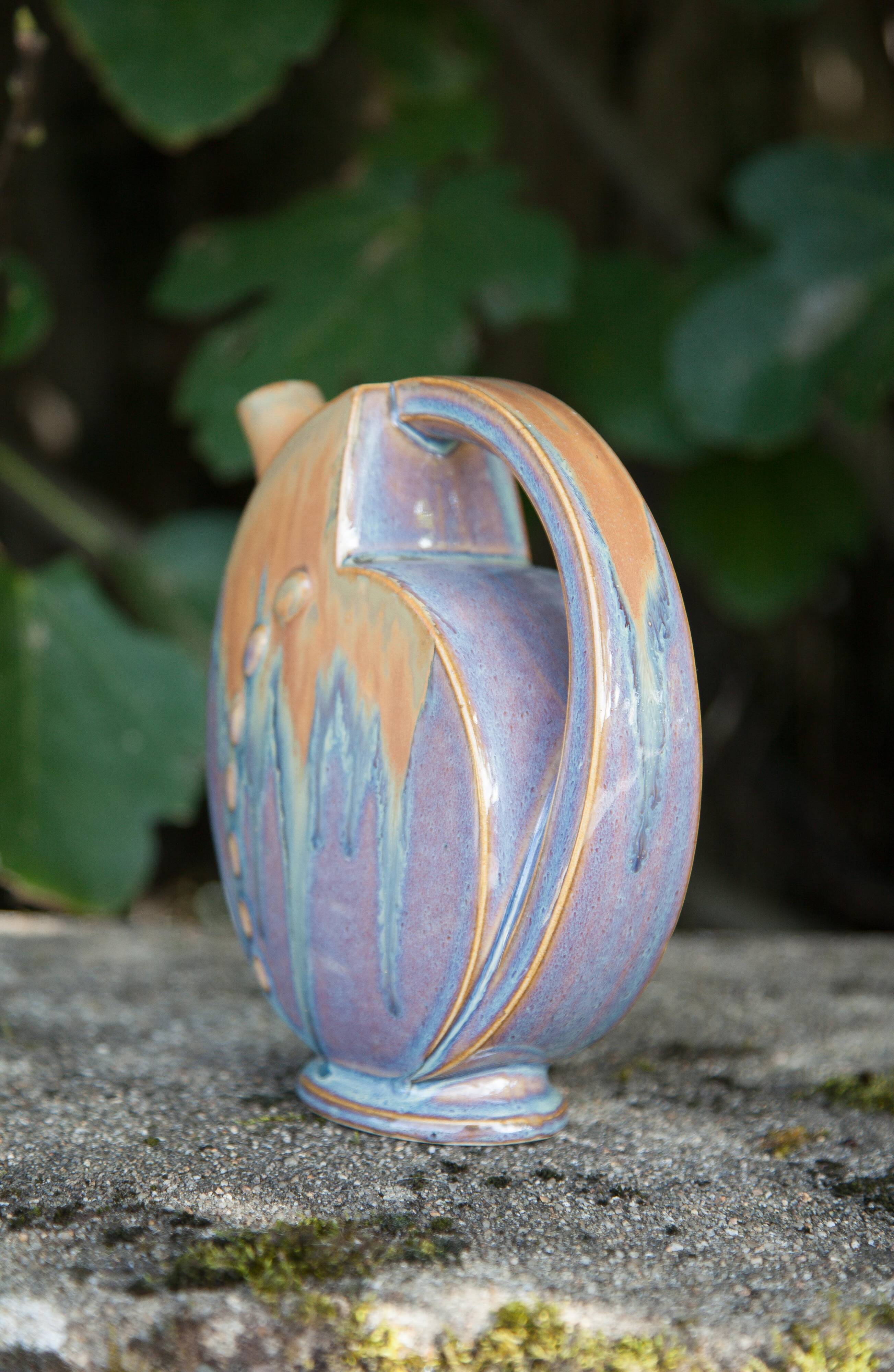 Flamed enameled stoneware bottle, pitcher, liquor bottle signed Denbac number 610, art vase