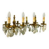 Pair of gilt bronze wall sconces with pendants from the mid-20th century.