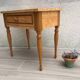 Formica and vintage wood bedside table