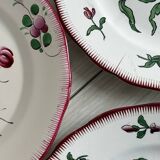 5 plates with colorful Sarreguemines floral designs.