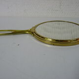 Old mirror double face with golden hand
