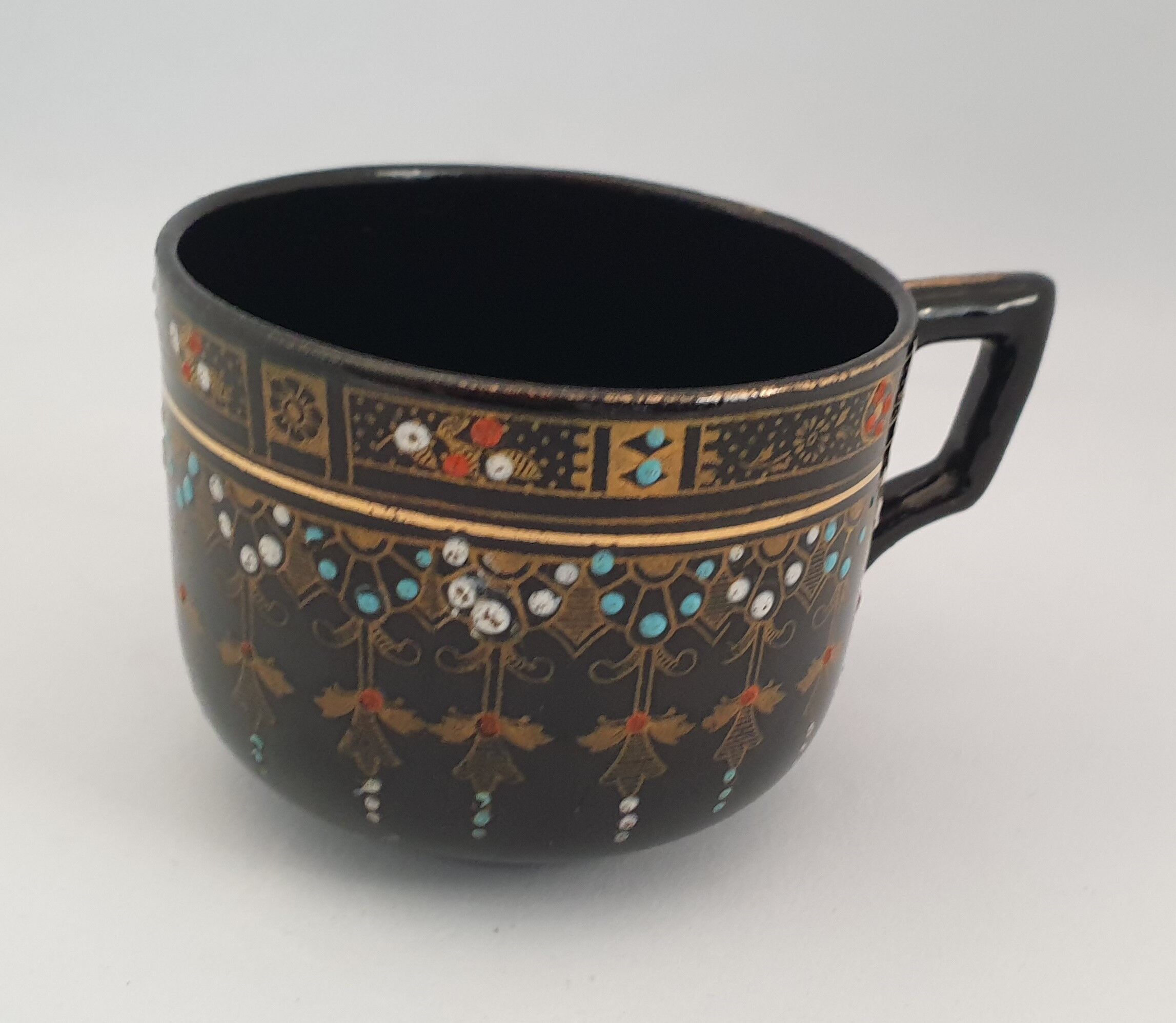 Six coffee cups and saucers in English earthenware Gibson & sons