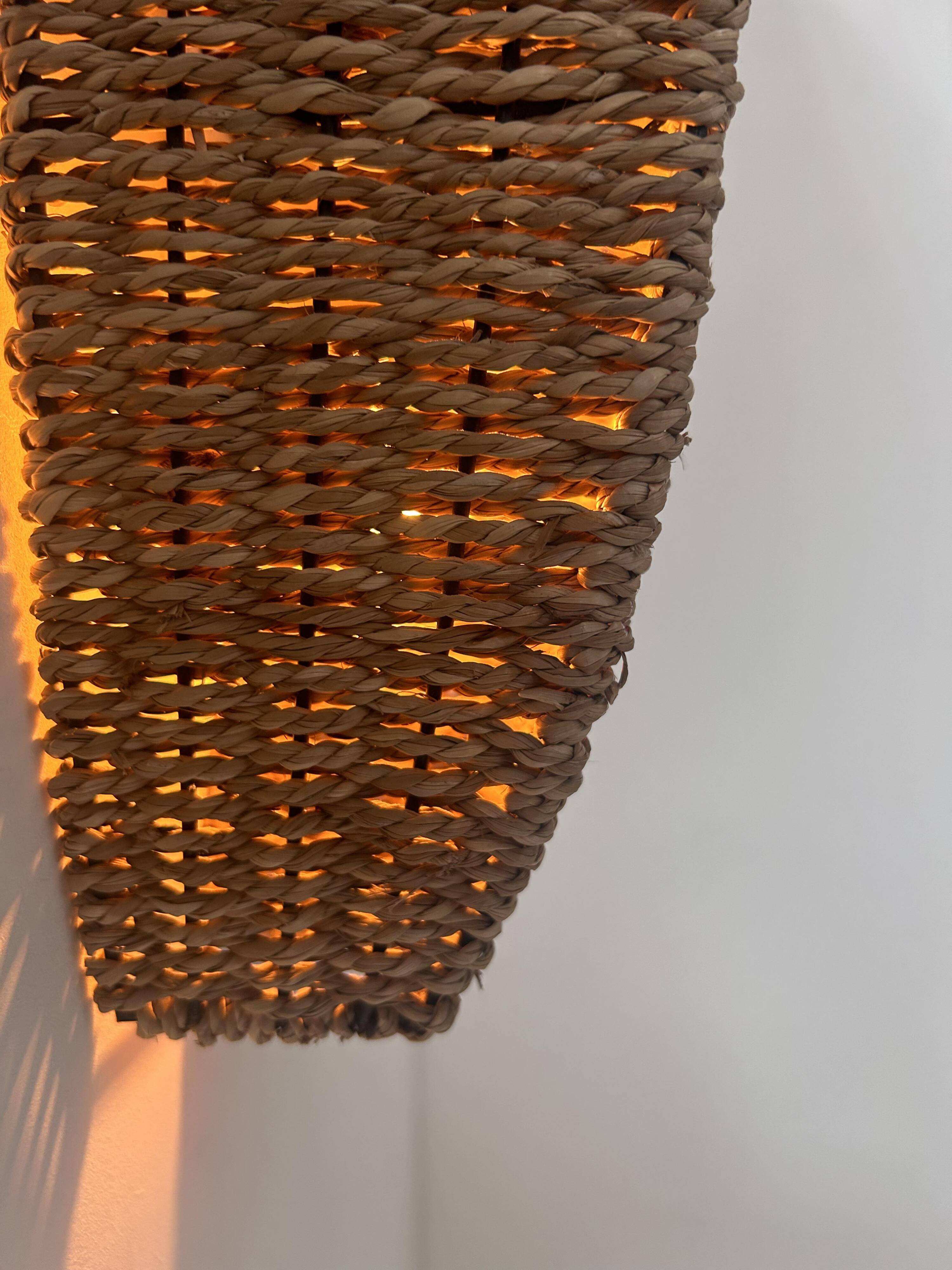 Pair of vintage wall lights, woven rattan, France 1980