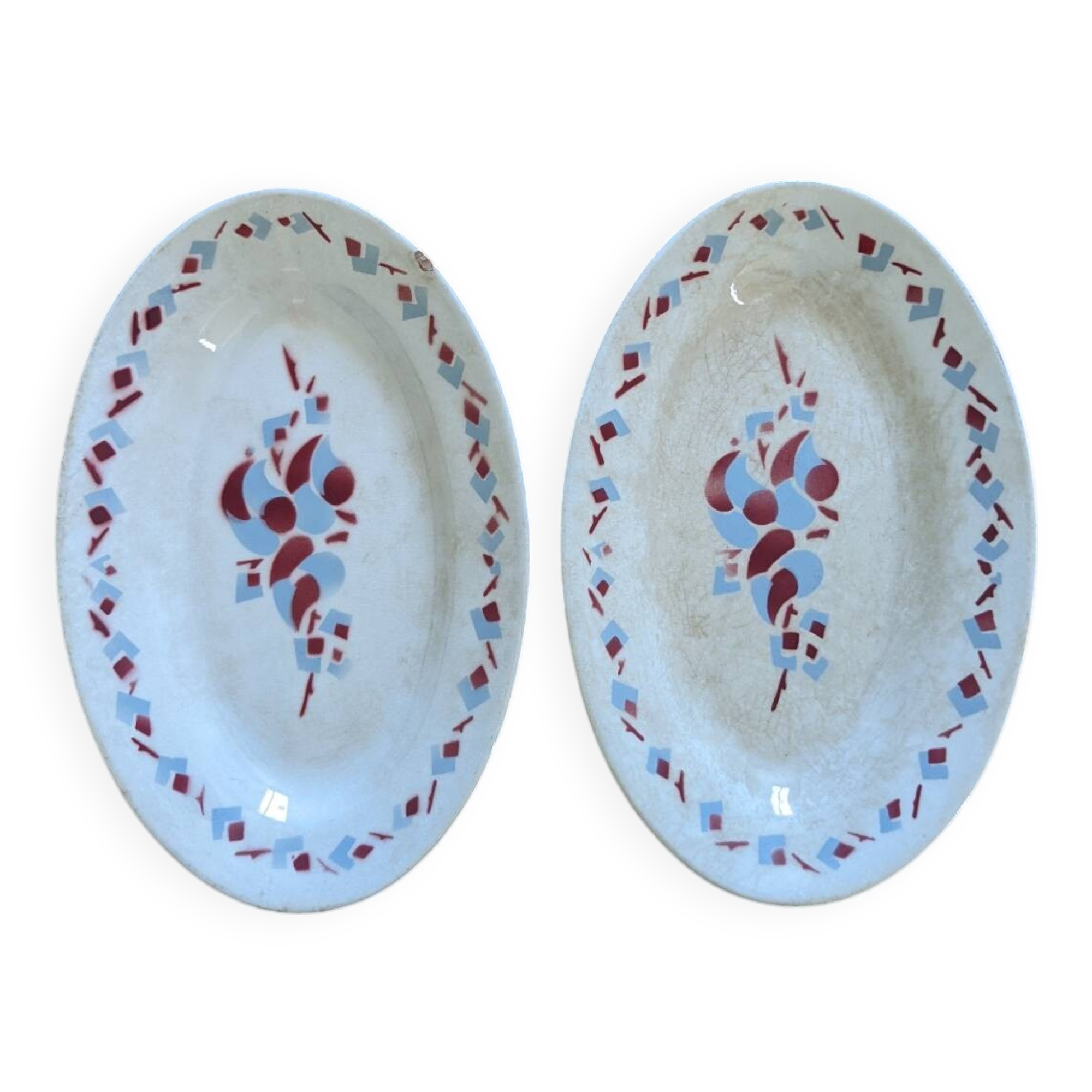 Pair of Moulin des loups dishes