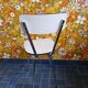 Extendable formica table and vintage 1960s chairs.
