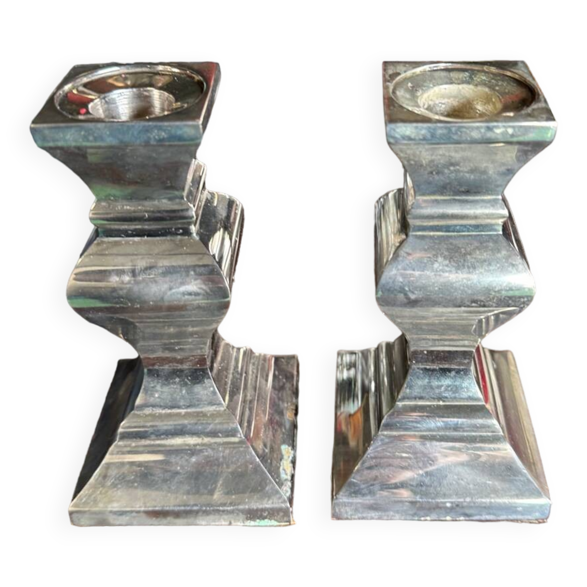 Pair of silver-plated metal candlesticks
