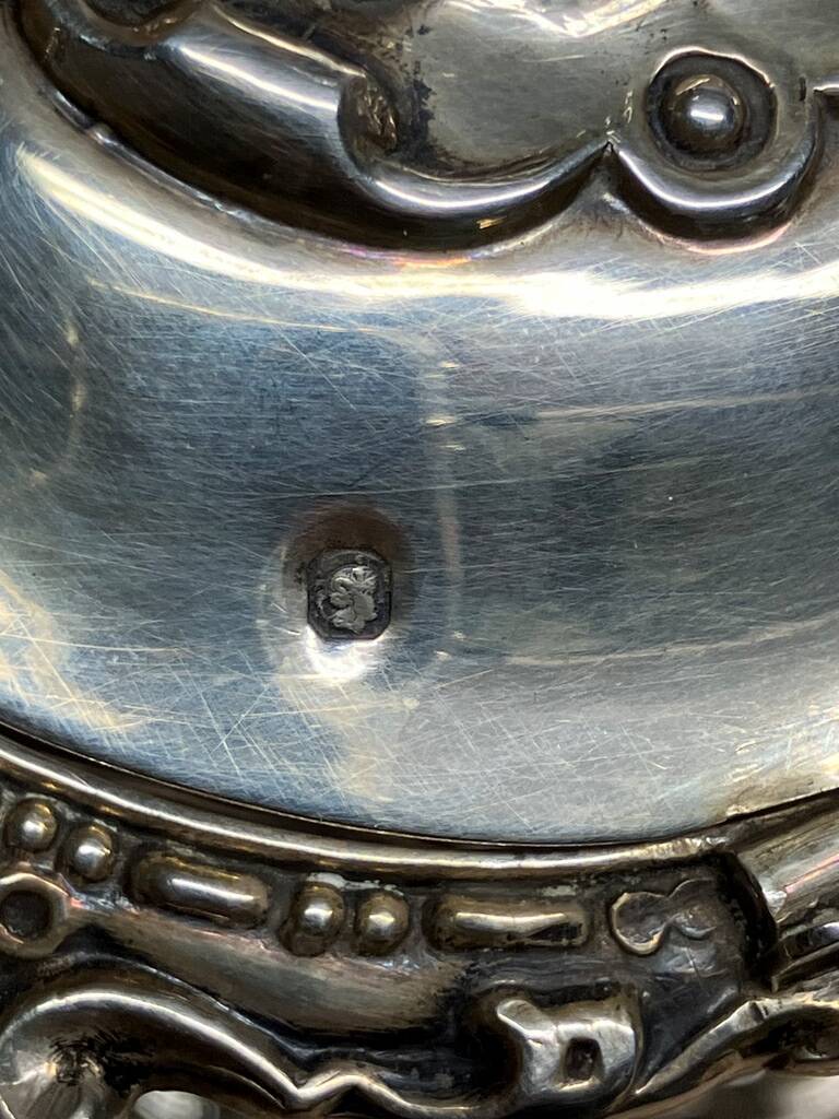 A lovely Regency-style silver mustard pot from the 19th century.