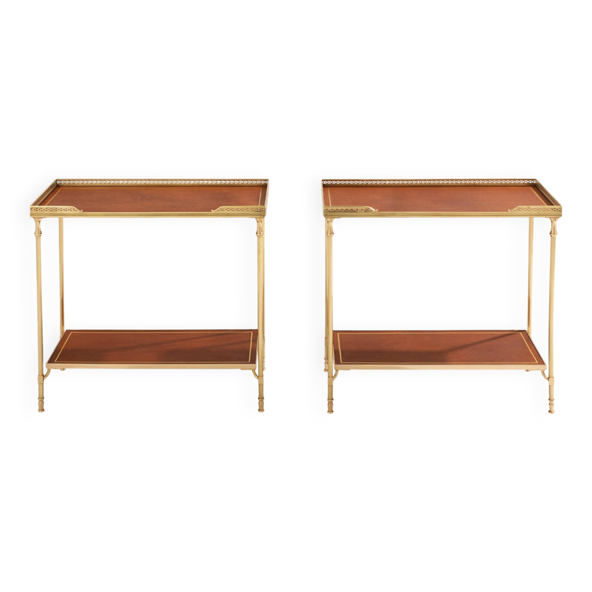 Pair of neoclassical brass and leather side tables by Maison Jansen, 1960