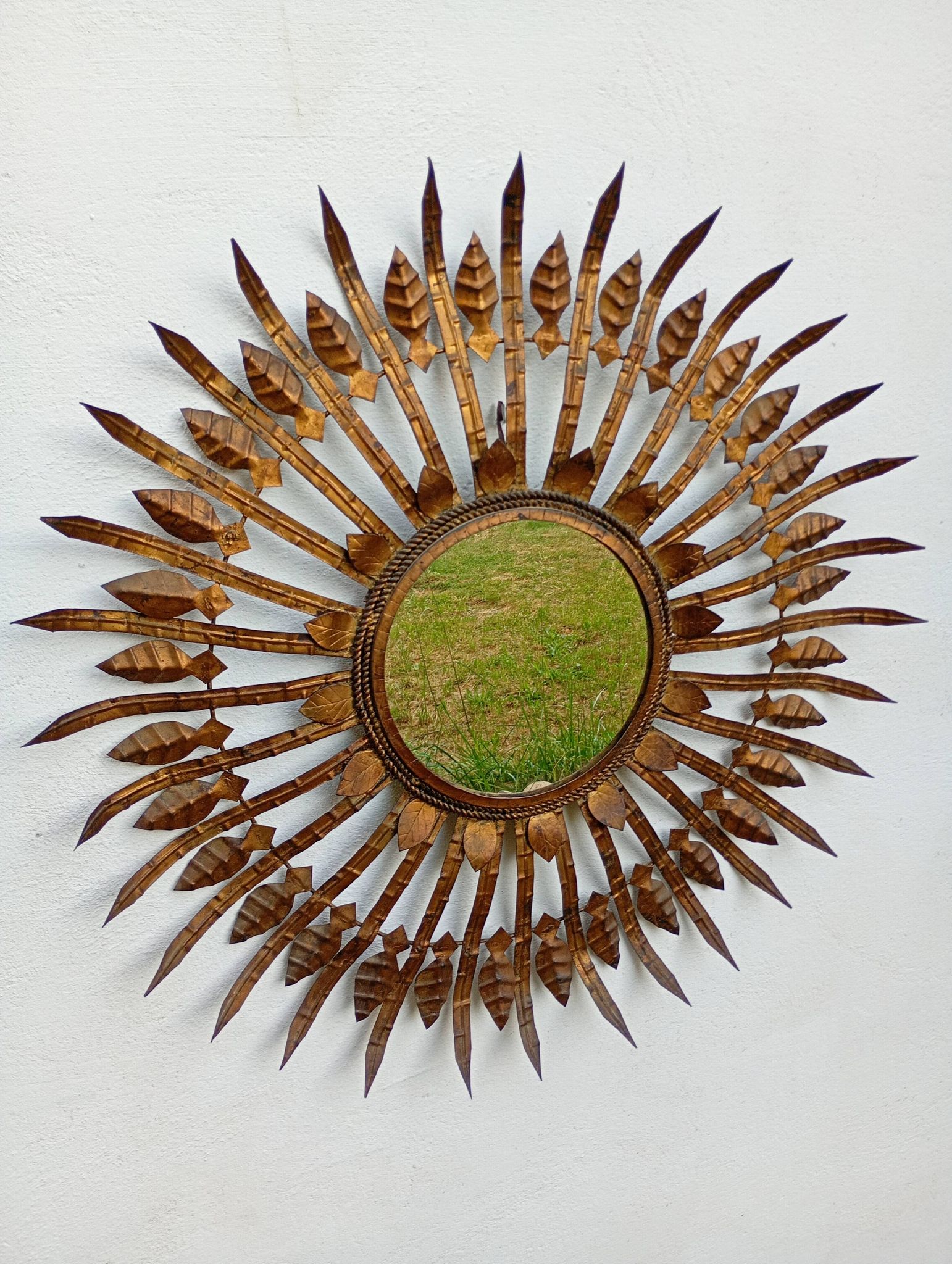 Vintage sun mirror in patinated gold metal – Spain 1950s / 60s