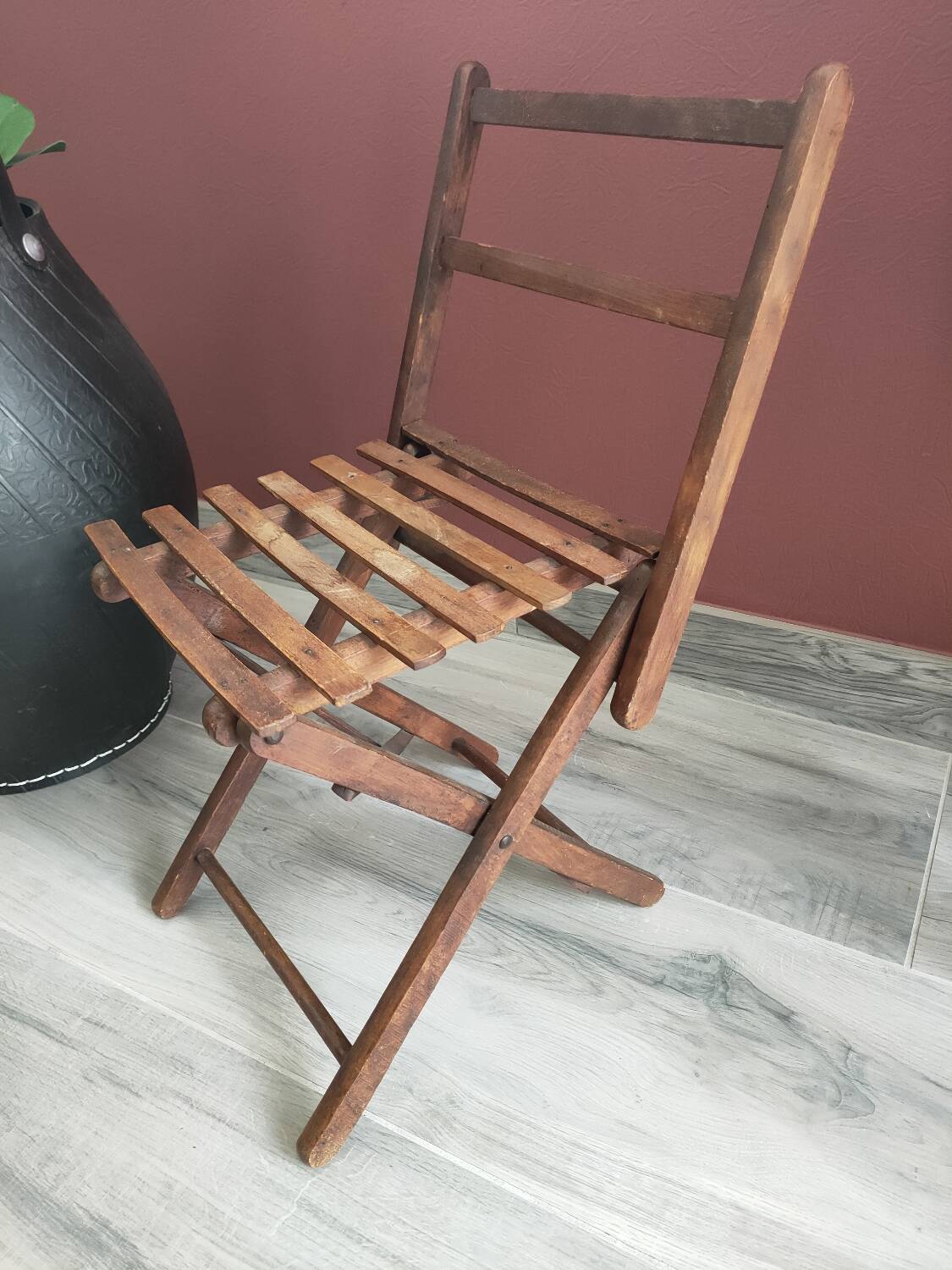 Small folding wooden chair