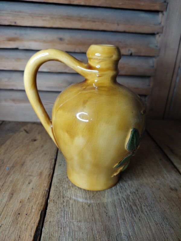 Calvados decanter in vintage antique ceramic