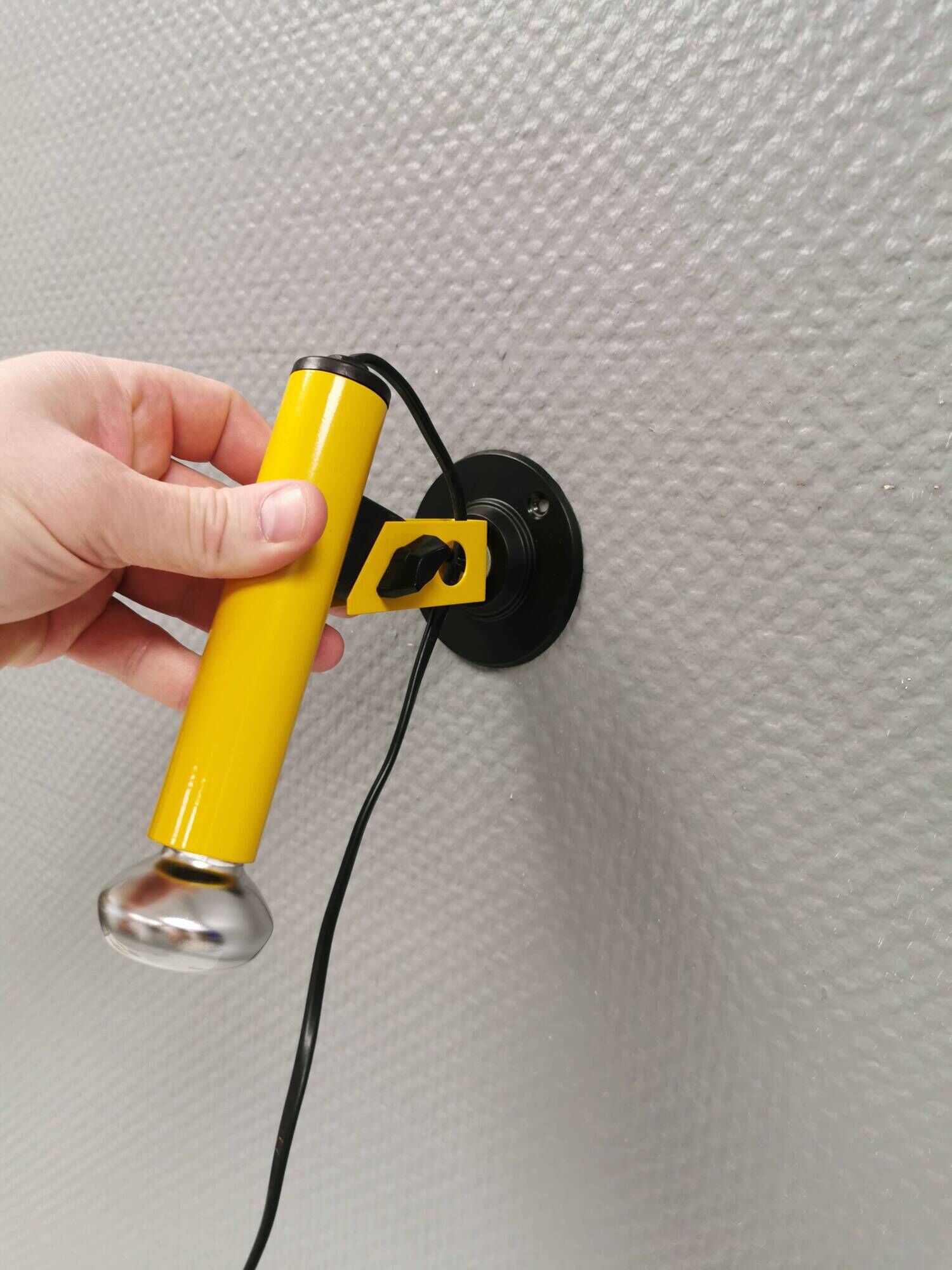 Small wall lamp in beautiful yellow color from Danish Nordlux 1980s.