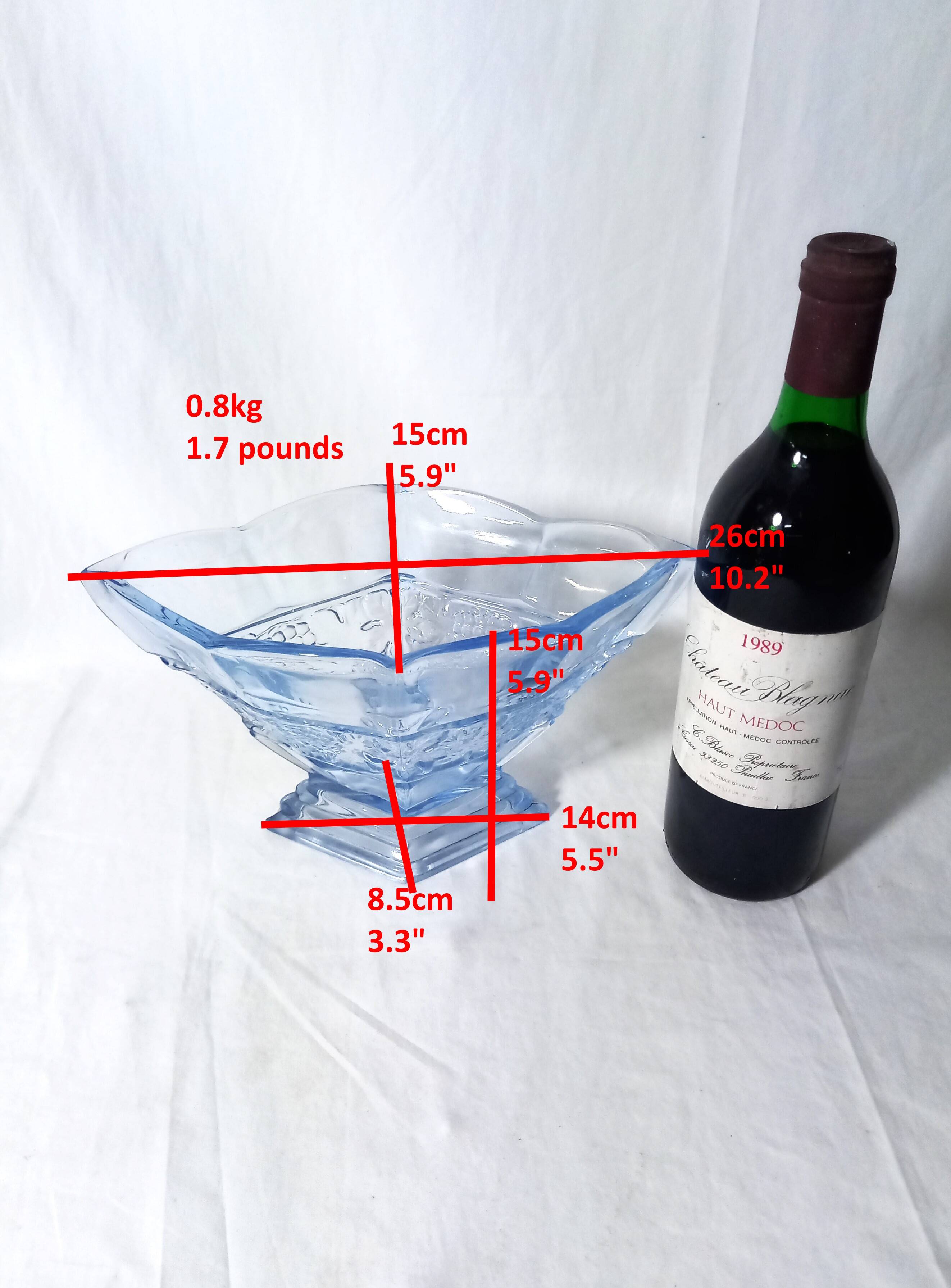 Art deco diamond-shaped vase in light blue color pressed molded glass