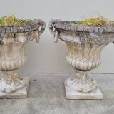 Pair of planter vases decorated with faces in reconstituted stone 1950s