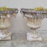 Pair of planter vases decorated with faces in reconstituted stone 1950s