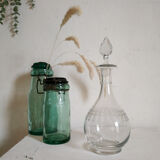 Old wine carafe in glass worked