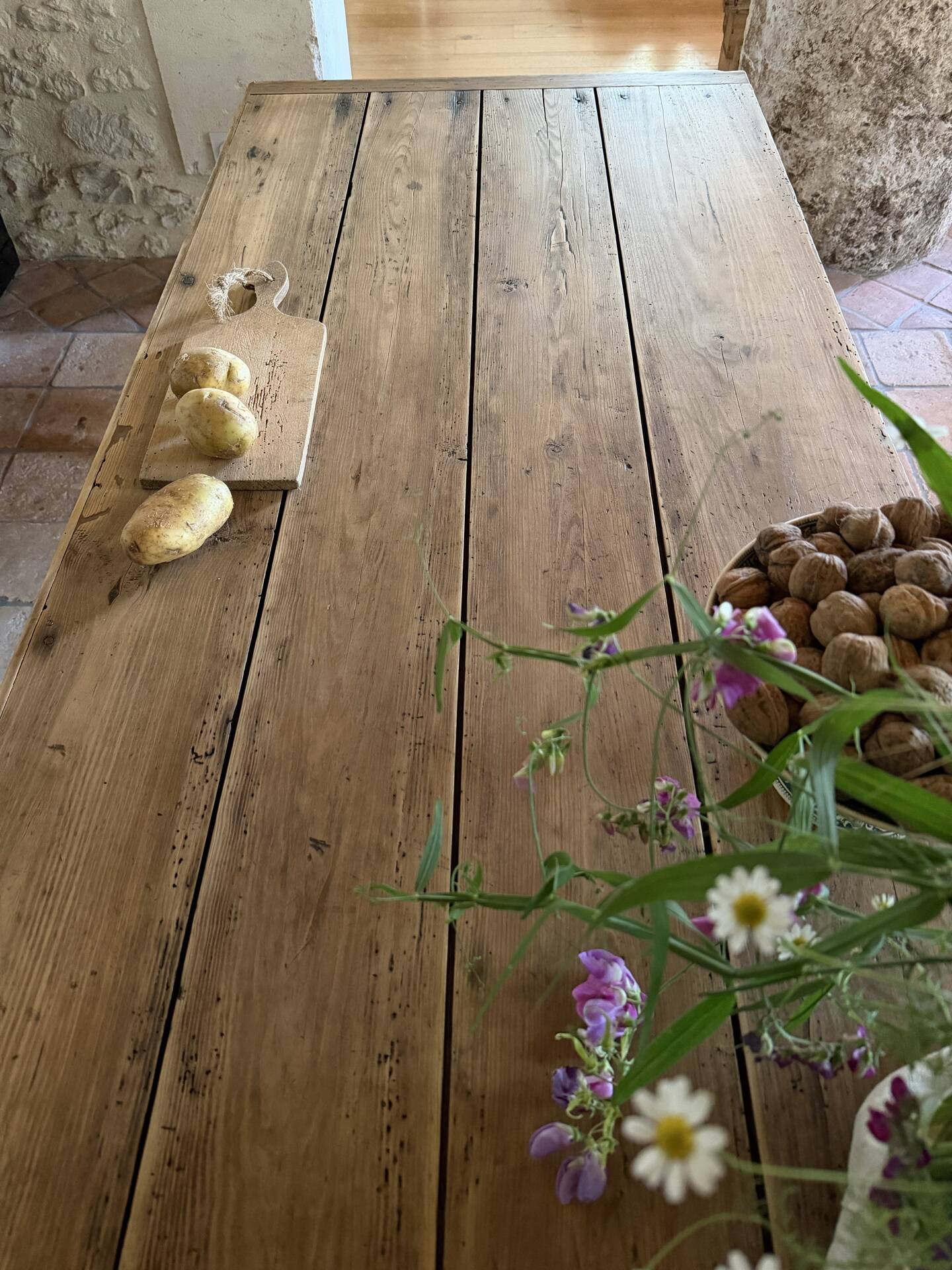 Renovated raw wood farmhouse table