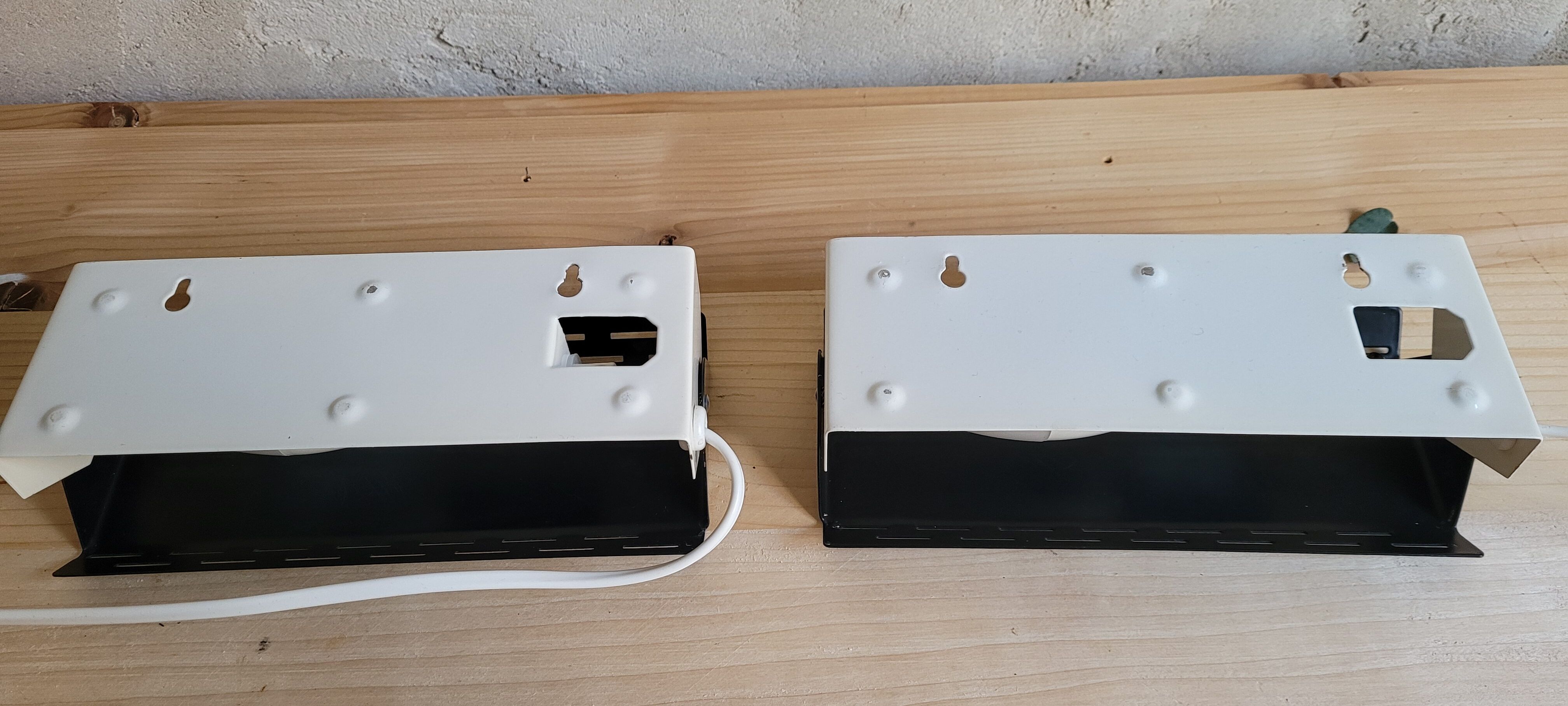 Pair of wall sconces with adjustable shutter