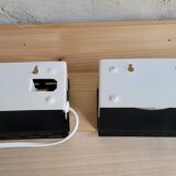 Pair of wall sconces with adjustable shutter