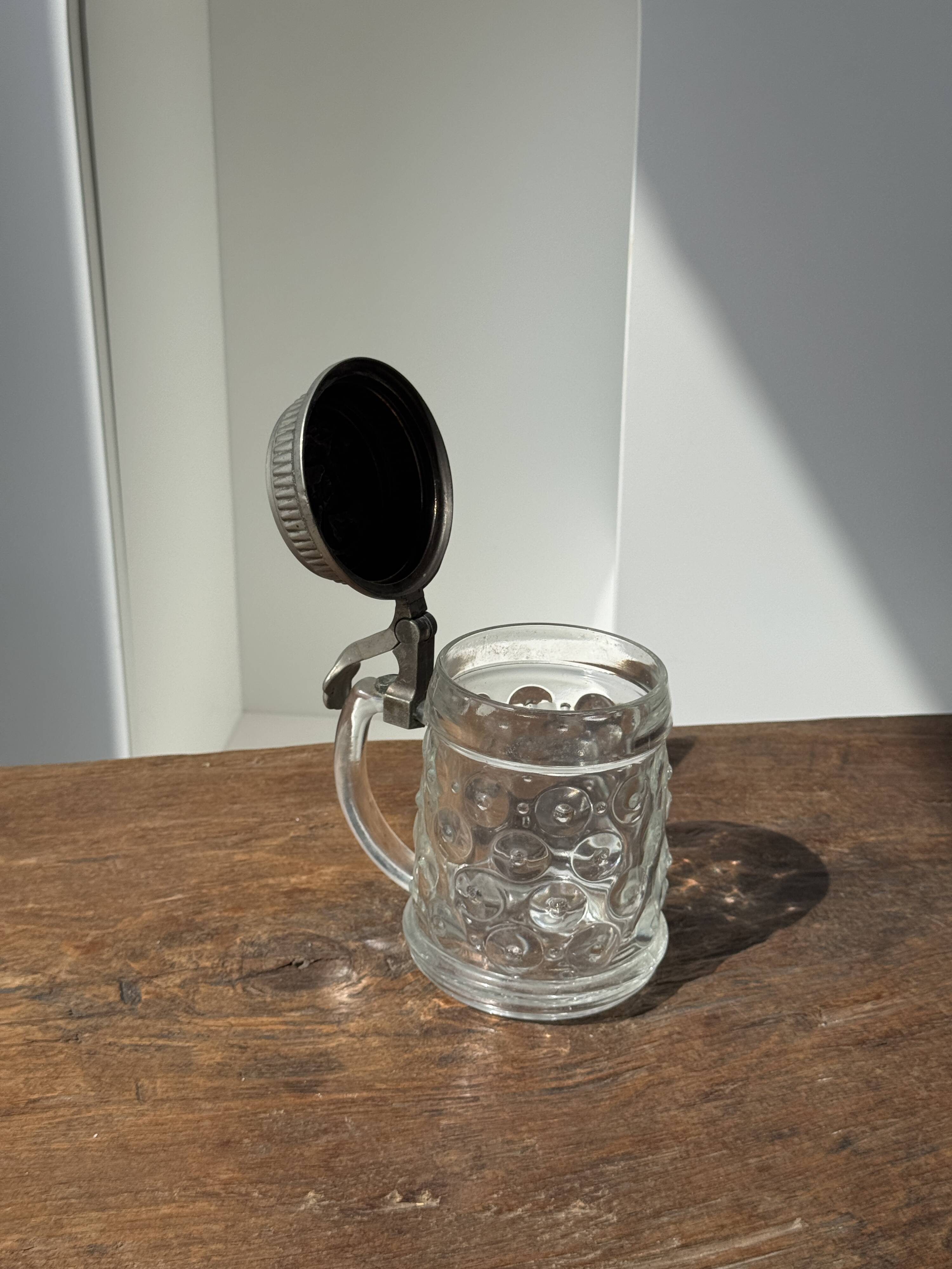 Alsatian beer mug with figurative pewter lid