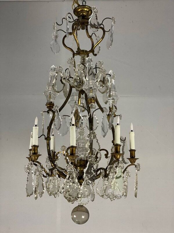 Lustre cage en bronze garni de pampilles de cristal taillé, 12 feux de lumière