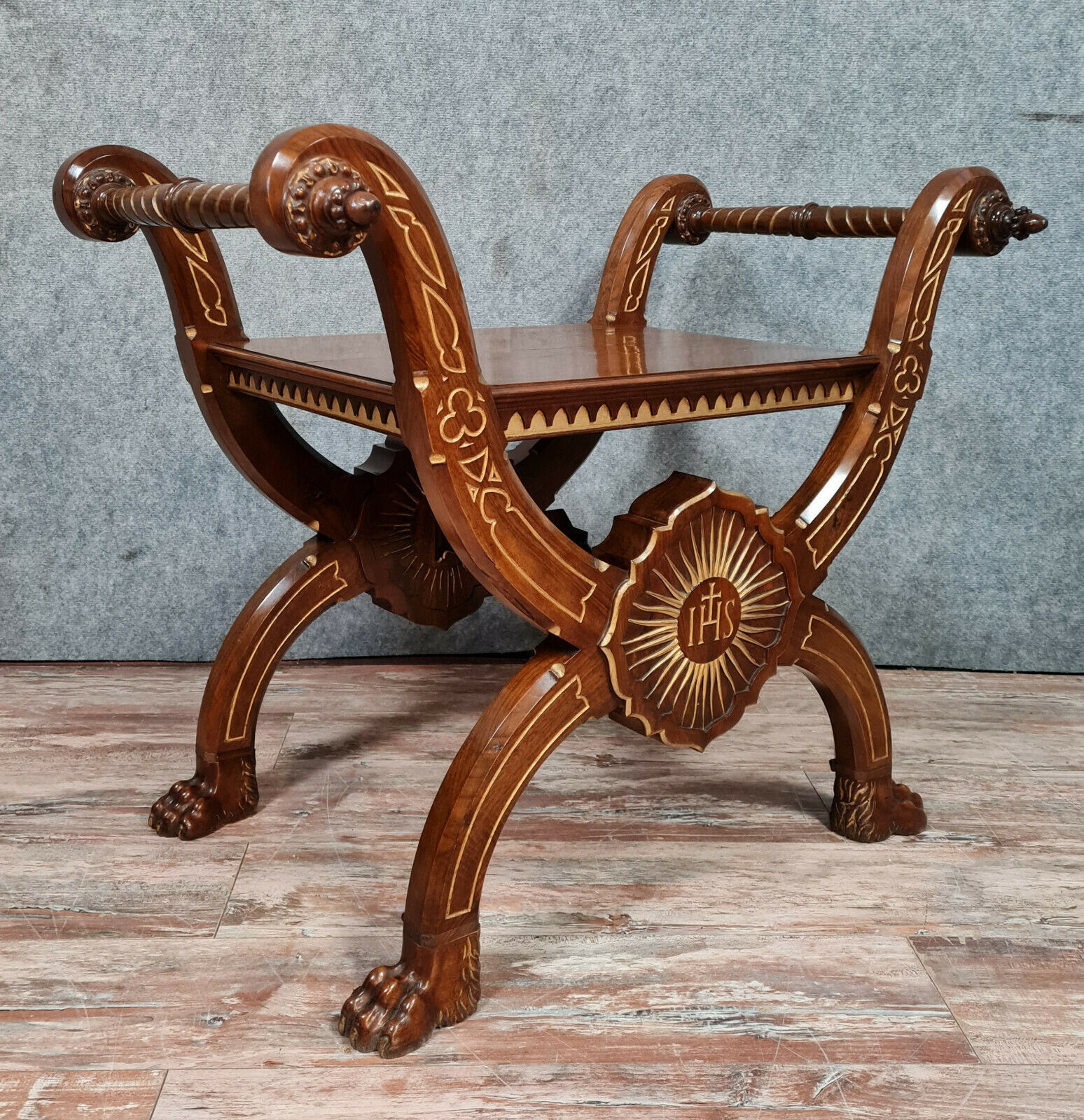 Bishop's curule armchair in solid walnut and gilding highlights with religious symbols