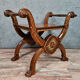 Bishop's curule armchair in solid walnut and gilding highlights with religious symbols