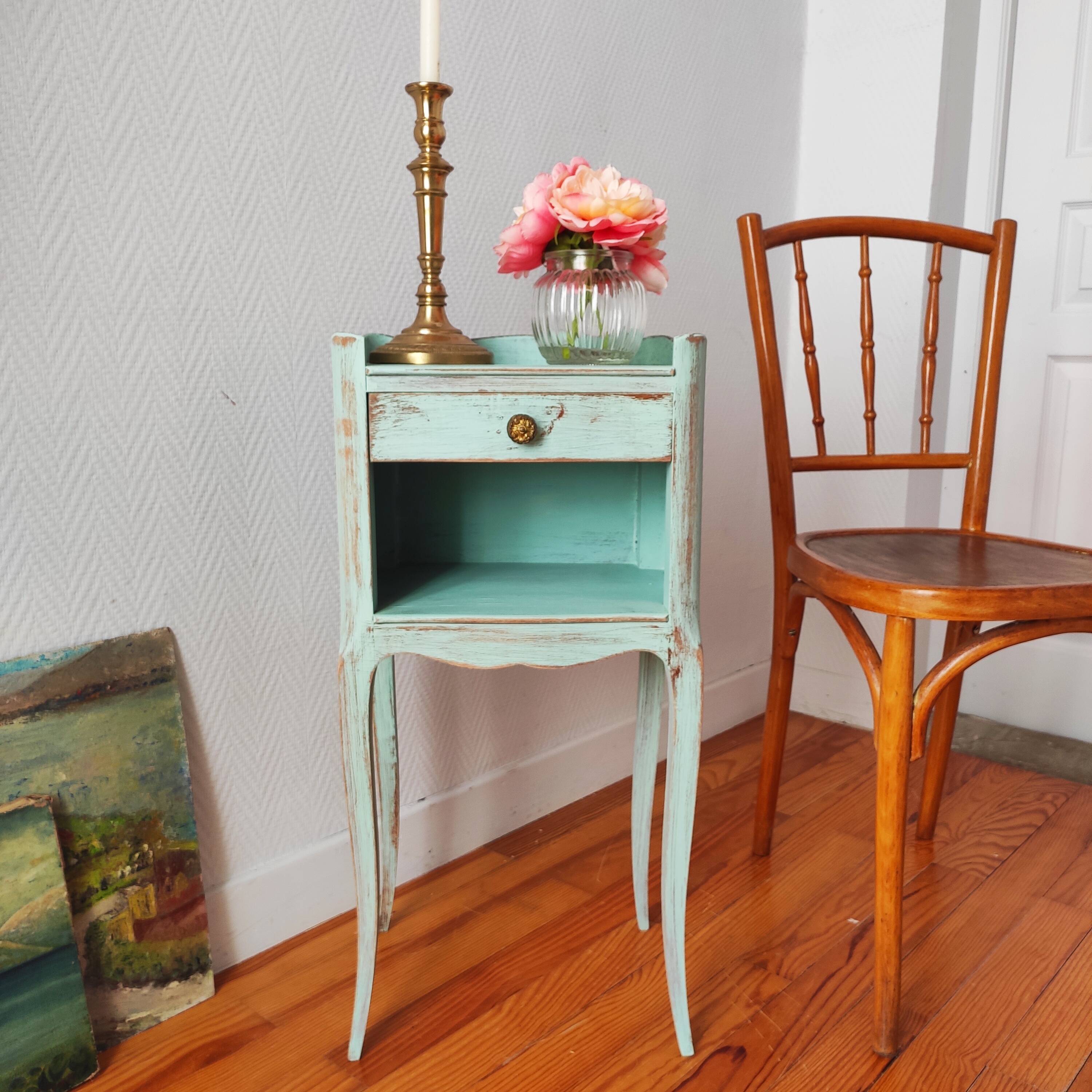Patinated bedside table end of sofa