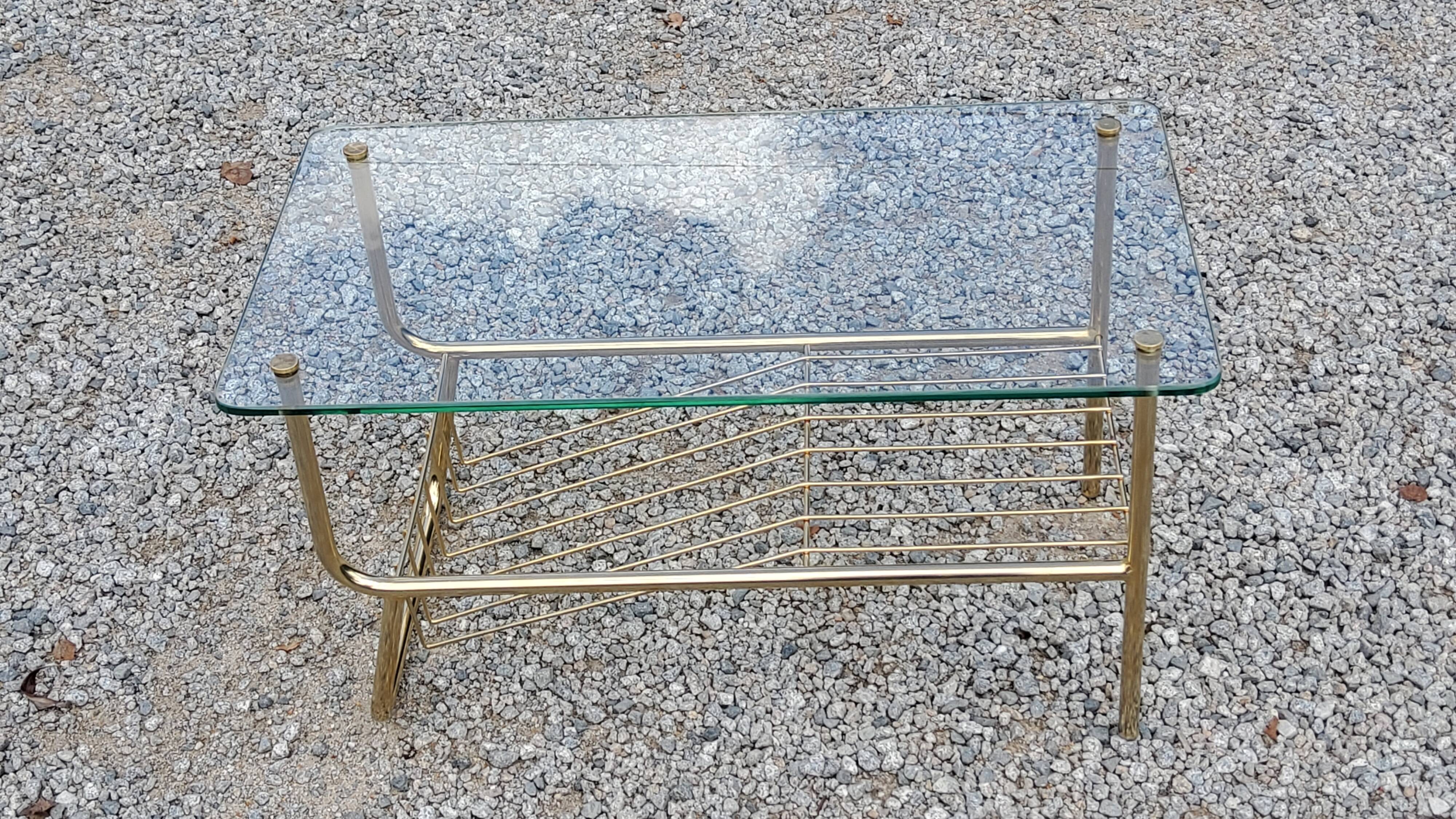 Coffee table from the 60s top glass base metal gilded