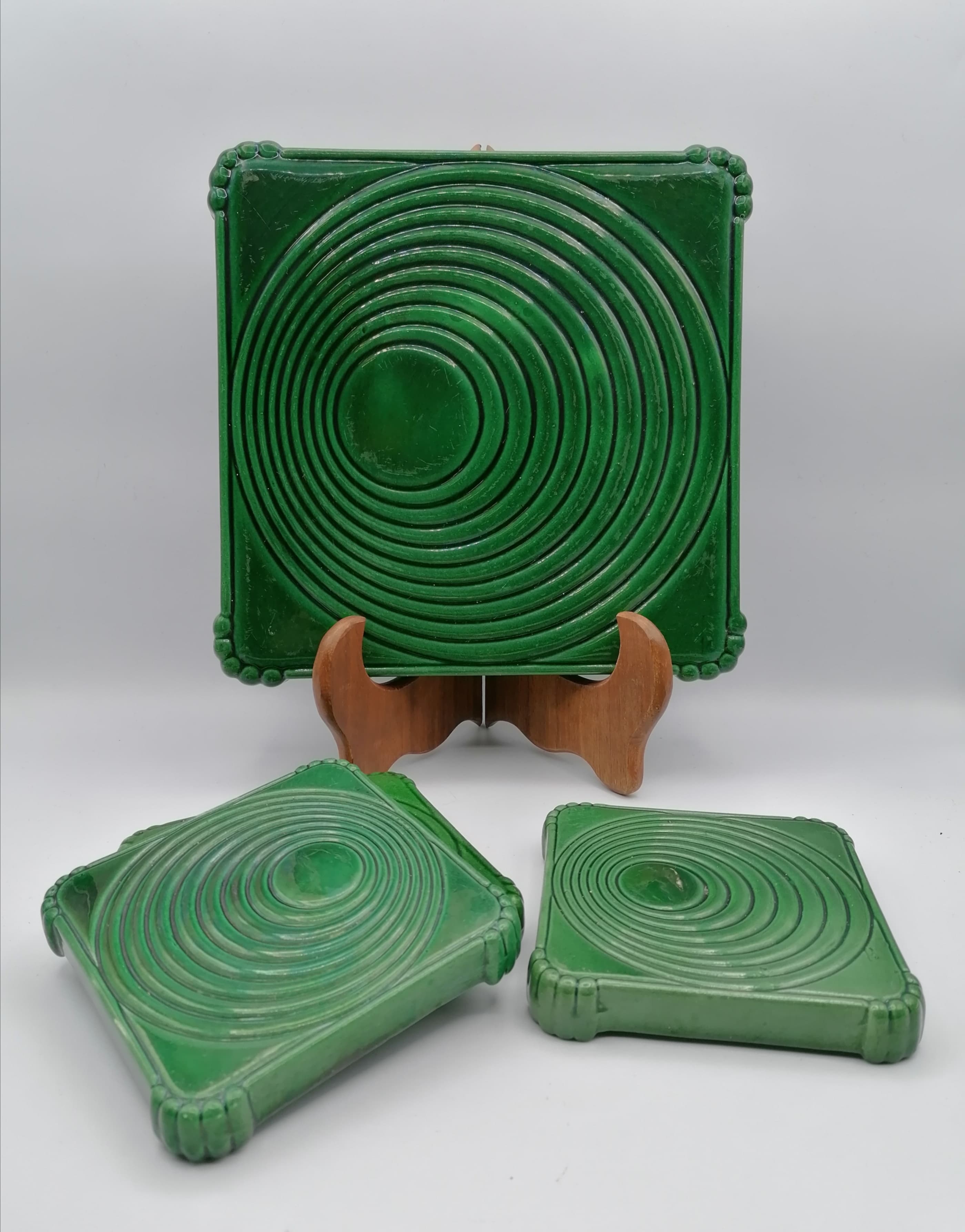 Under the plate and 3 under the bottle