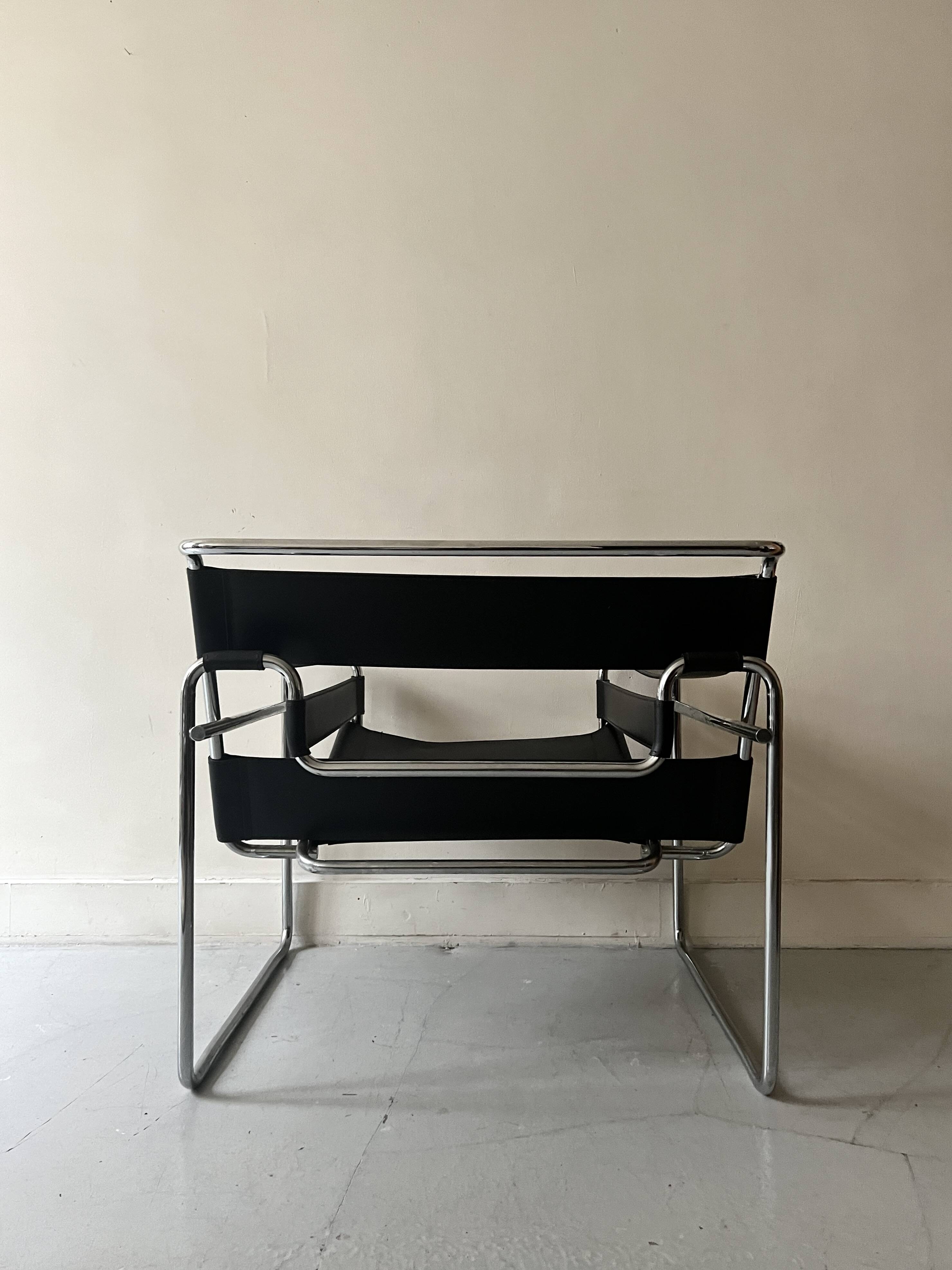 Wassily tubular armchair in chrome & black leather, designed by Marcel Breuer in 1970.