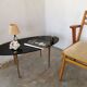 Oval coffee table in black opaline